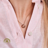 minrl aura necklace fairmined gold worn