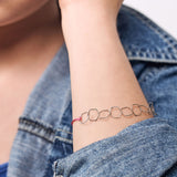 minrl hexagons light bracelet silver worn closeup