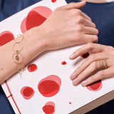 minrl rings bracelet yellow gold worn