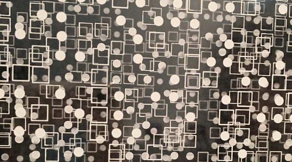 Square and circular white shapes on a black background