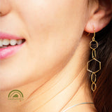 minrl hexagons air earrings fairmined gold worn