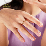 Hand with a calypso ring made in 'Fairmined' gold part of the Odyssey collection