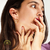 minrl rings earrings fairmined yellow gold worn