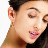 minrl rings earrings fairmined yellow gold worn