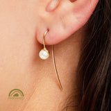 minrl snowdrop long earrings fairmined red gold worn