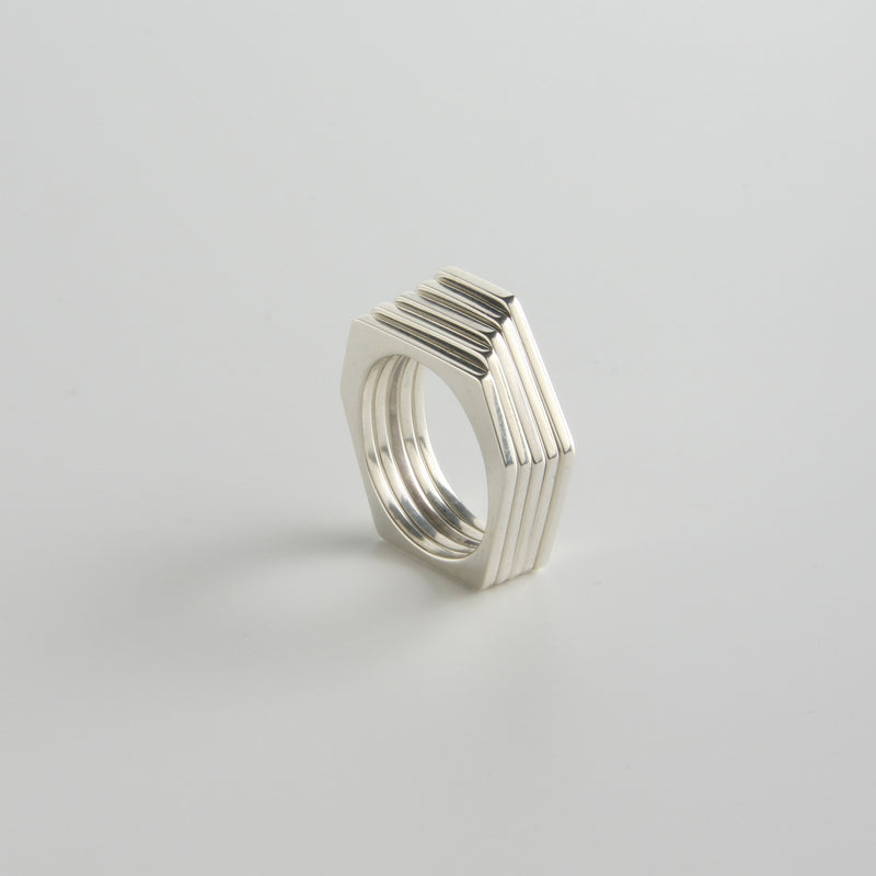 minrl random polygons rings hexagons silver stacked front
